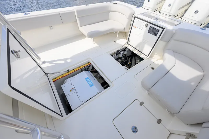  Yacht Photos Pics 2021 SeaVee 390Z boat interior with open storage compartments and seating area.