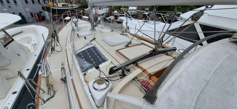 Blue Skies Yacht Photos Pics 1990 Able Chuck Paine Sloop deck with solar panel and rigging.