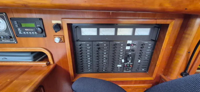 Blue Skies Yacht Photos Pics Electrical panel of 1990 Able Chuck Paine Sloop with gauges and controls.
