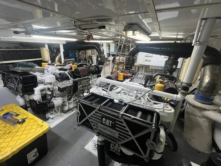  Yacht Photos Pics Engine room of a 2000 Rizzardi 75 yacht with CAT machinery and equipment.
