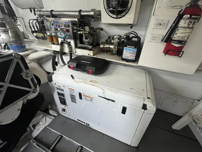  Yacht Photos Pics Engine room of a 2000 Rizzardi 75 yacht with Kohler generator and equipment.