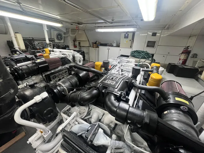  Yacht Photos Pics Engine room of a 2000 Rizzardi 75 yacht, featuring complex machinery and equipment.