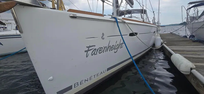 Farenheight Yacht Photos Pics Beneteau Oceanis 40 sailboat docked, 2008 model, named "Farenheight," side view.