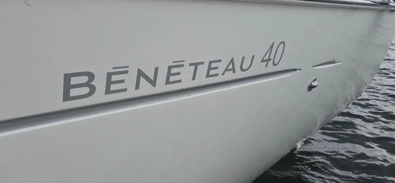 Farenheight Yacht Photos Pics Beneteau Oceanis 40 sailboat, 2008 model, close-up of hull on water.