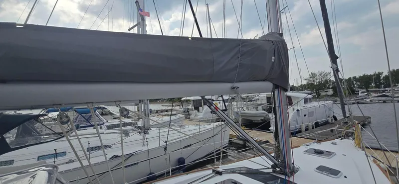 Farenheight Yacht Photos Pics Beneteau Oceanis 40 sailboat docked at marina, 2008 model, with overcast sky.