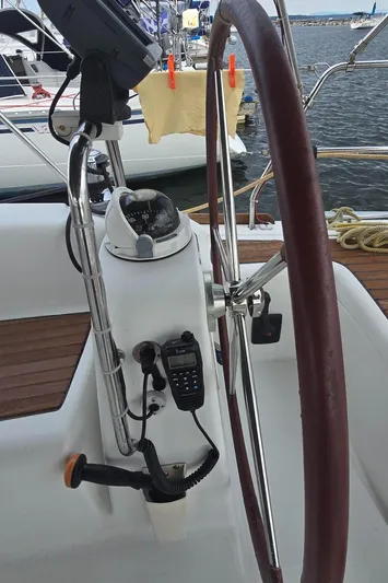 Farenheight Yacht Photos Pics Steering wheel and navigation equipment on a 2008 Beneteau Oceanis 40 sailboat.