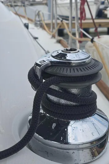 Farenheight Yacht Photos Pics Winch on 2008 Beneteau Oceanis 40 sailboat, with rope coiled around it.