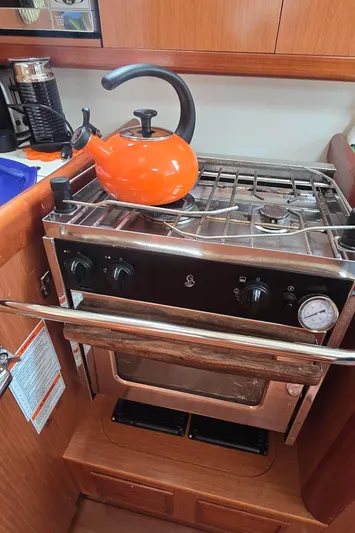 Farenheight Yacht Photos Pics Galley stove with orange kettle on Beneteau Oceanis 40, 2008 model.