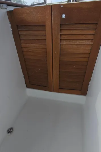 Farenheight Yacht Photos Pics Wooden louvered doors on a 2008 Beneteau Oceanis 40 sailboat.