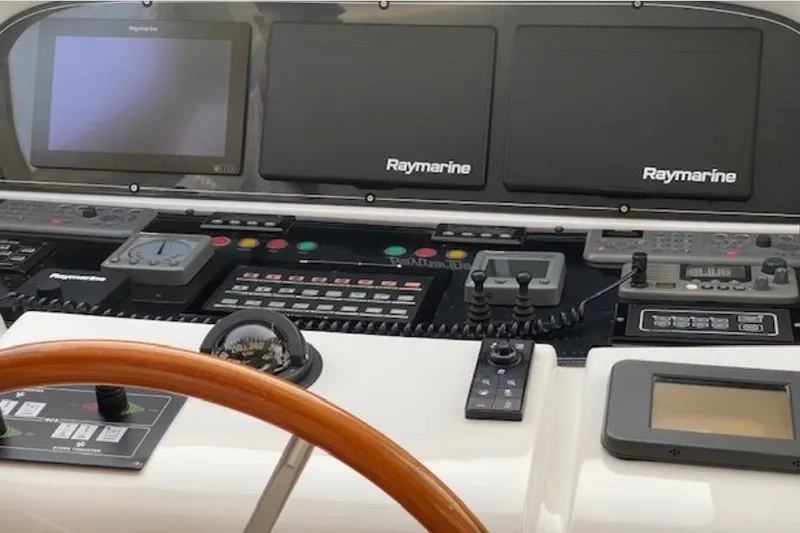  Yacht Photos Pics Control panel of 2010 Maiora MAIORA 27 yacht with Raymarine navigation equipment.