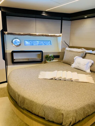 Murano Yacht Photos Pics Luxurious bedroom interior of 2018 Azimut 72 FLY yacht with modern design and cozy bedding.