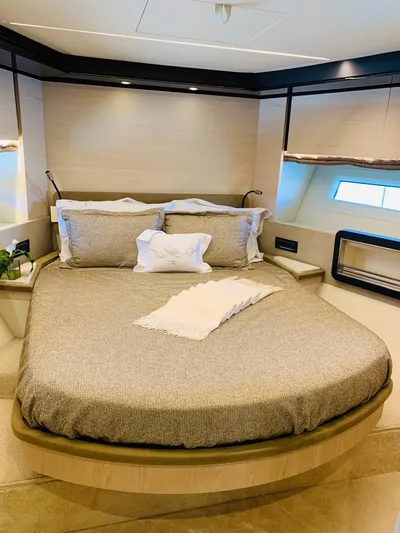 Murano Yacht Photos Pics Luxurious bedroom interior of 2018 Azimut 72 FLY yacht with elegant bedding and modern design.