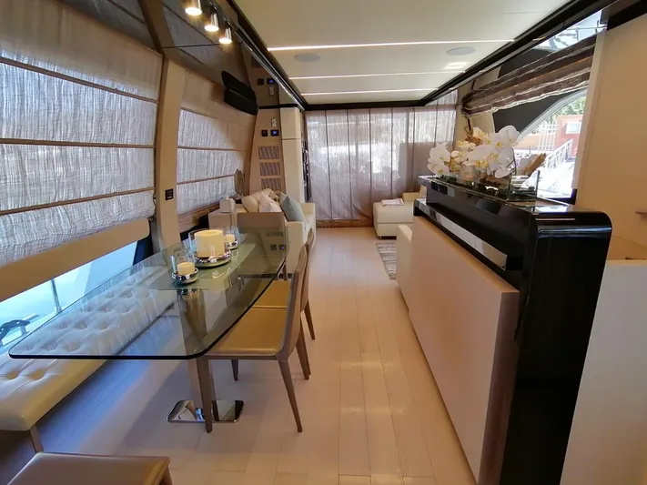 Murano Yacht Photos Pics Luxurious interior of 2018 Azimut 72 FLY yacht with elegant dining area and modern decor.