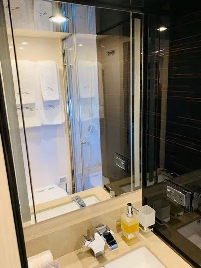 Murano Yacht Photos Pics Luxurious bathroom in 2018 Azimut 72 FLY yacht with modern fixtures and elegant design.