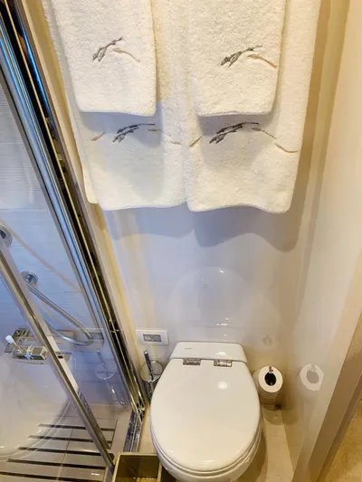 Murano Yacht Photos Pics Luxury bathroom in 2018 Azimut 72 FLY yacht with elegant towels and modern fixtures.