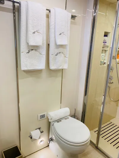 Murano Yacht Photos Pics Luxurious bathroom in 2018 Azimut 72 FLY yacht with modern fixtures and elegant design.