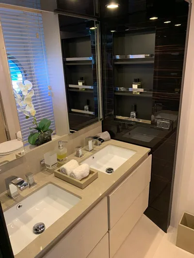 Murano Yacht Photos Pics Luxurious bathroom in 2018 Azimut 72 FLY yacht with dual sinks and elegant decor.