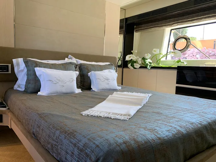 Murano Yacht Photos Pics Luxurious bedroom interior on 2018 Azimut 72 FLY yacht with elegant bedding and decor.