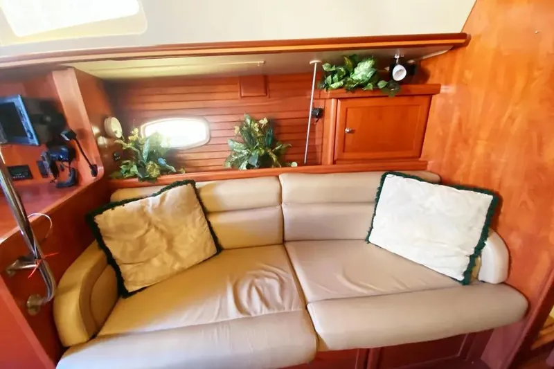Pending Yacht Photos Pics Luxurious interior of 2012 Hunter Aft Cockpit 50 yacht with cozy seating and decor.