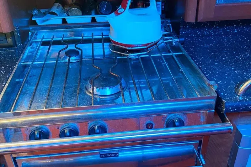 Pending Yacht Photos Pics Stove in a 2012 Hunter Aft Cockpit 50 yacht kitchen with kettle.