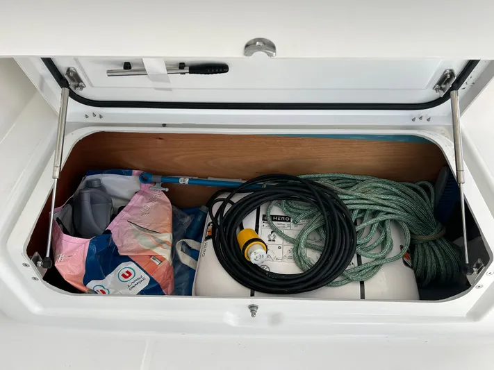  Yacht Photos Pics Storage compartment of 2024 Lagoon 46 yacht with ropes and equipment.
