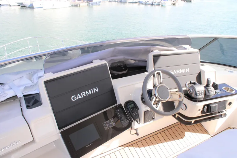  Yacht Photos Pics Cockpit of 2025 Absolute NAVETTA 70 yacht with Garmin navigation systems.