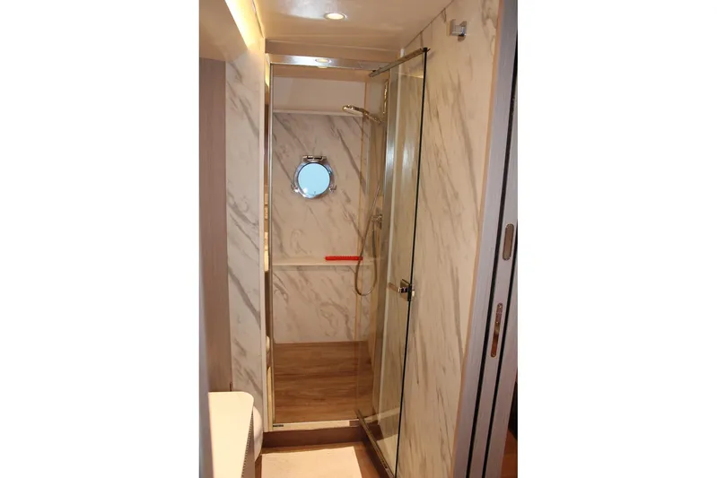  Yacht Photos Pics Luxurious bathroom with marble walls in 2025 Absolute NAVETTA 70 yacht.