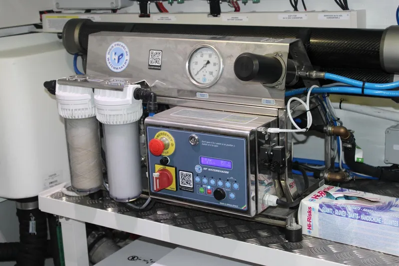  Yacht Photos Pics Watermaker system in Absolute NAVETTA 70 yacht, 2025 model, with control panel and filters.