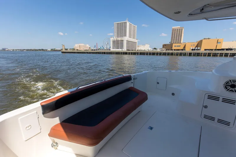 Silver Lining Yacht Photos Pics 2000 Sea Ray 400 Sedan Bridge yacht with city skyline and waterfront view.