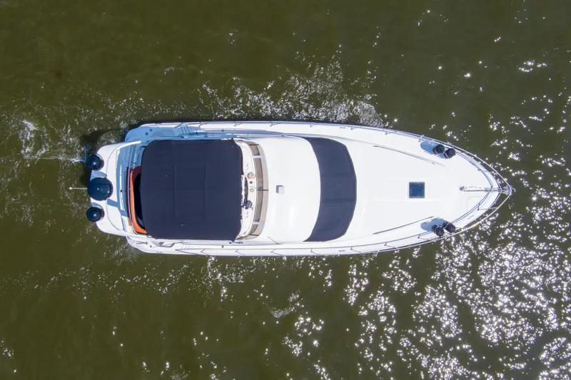 Silver Lining Yacht Photos Pics Overhead view of 2000 Sea Ray 400 Sedan Bridge yacht on water.