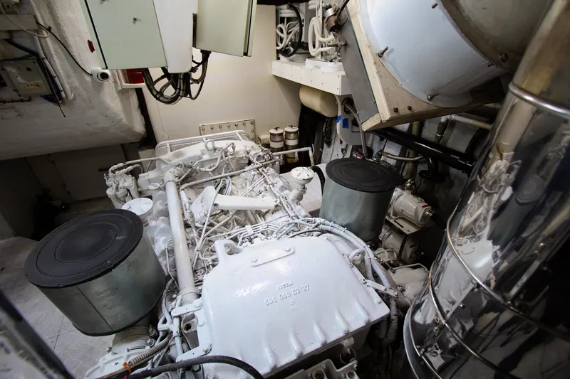 Julia Too Yacht Photos Pics Engine room of a 2002 Azimut 70 Sea Jet yacht, showcasing mechanical components.