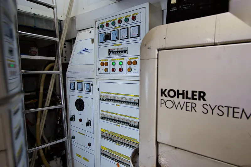 Julia Too Yacht Photos Pics Engine room of 2002 Azimut 70 Sea Jet with Kohler power system and control panels.