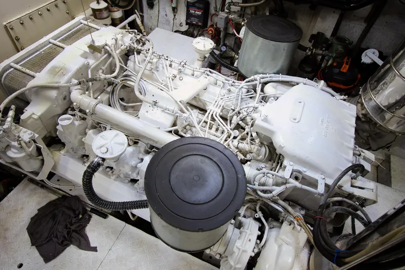 Julia Too Yacht Photos Pics Engine room of a 2002 Azimut 70 Sea Jet yacht, showcasing complex machinery.