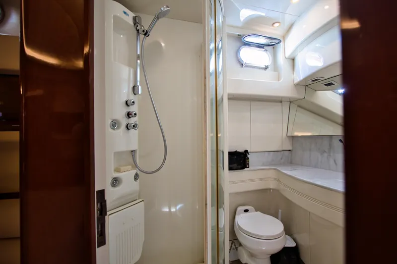 Julia Too Yacht Photos Pics Luxurious bathroom on 2002 Azimut 70 Sea Jet yacht with shower and toilet.