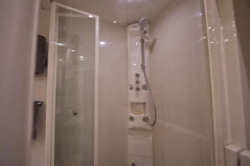 Julia Too Yacht Photos Pics Luxurious shower in 2002 Azimut 70 Sea Jet yacht bathroom.