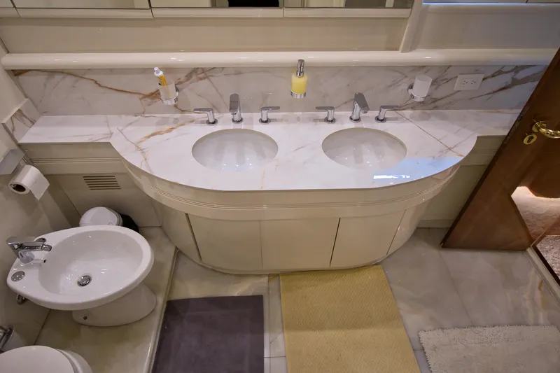 Julia Too Yacht Photos Pics Luxurious marble bathroom in a 2002 Azimut 70 Sea Jet yacht.