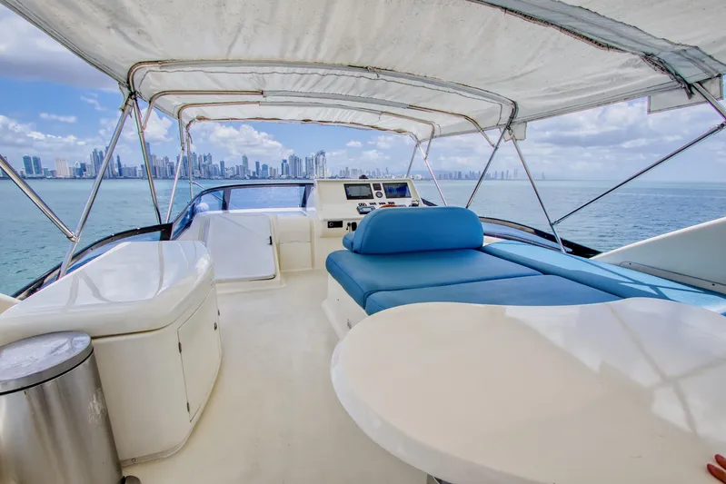 Julia Too Yacht Photos Pics Luxurious 2002 Azimut 70 Sea Jet yacht interior with city skyline view.