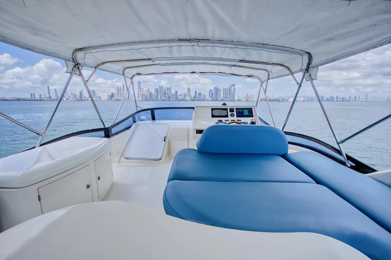Julia Too Yacht Photos Pics 2002 Azimut 70 Sea Jet yacht interior with city skyline view.