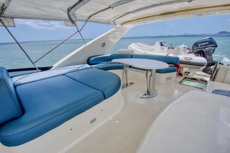 Julia Too Yacht Photos Pics Luxurious 2002 Azimut 70 Sea Jet yacht with spacious deck seating and ocean view.