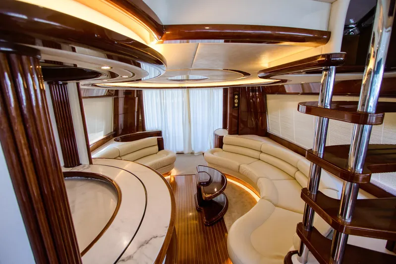Julia Too Yacht Photos Pics Luxurious interior of a 2002 Azimut 70 Sea Jet yacht with elegant seating and modern design.