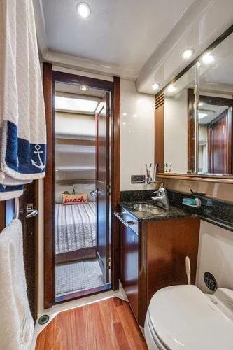  Yacht Photos Pics Luxurious bathroom in 2005 Sea Ray 52 Sedan Bridge yacht with modern amenities.