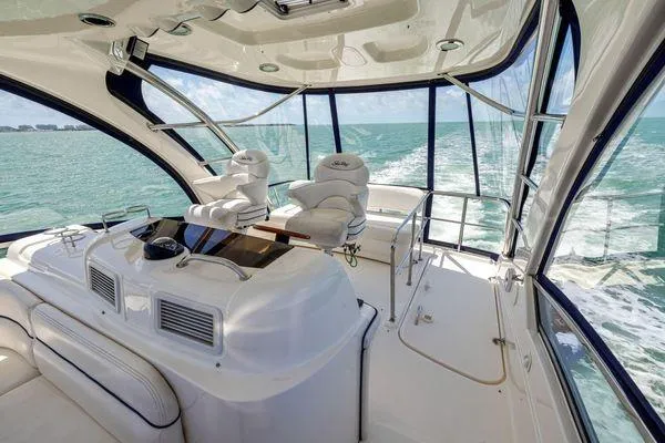  Yacht Photos Pics 2005 Sea Ray 52 Sedan Bridge yacht interior with ocean view and luxurious seating.
