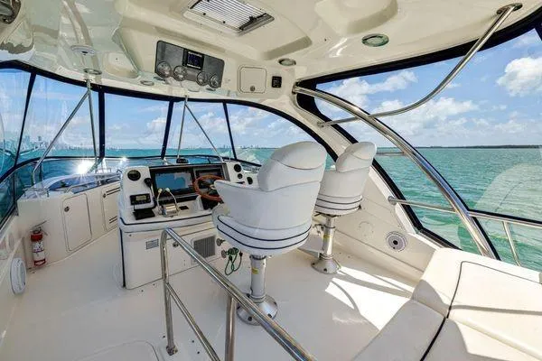  Yacht Photos Pics Luxurious 2005 Sea Ray 52 Sedan Bridge yacht interior with ocean view.