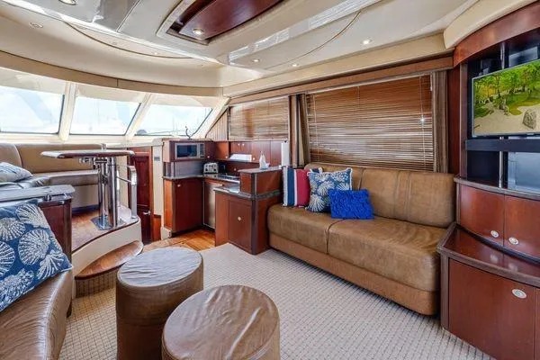  Yacht Photos Pics Luxurious interior of a 2005 Sea Ray 52 Sedan Bridge yacht with elegant furnishings.