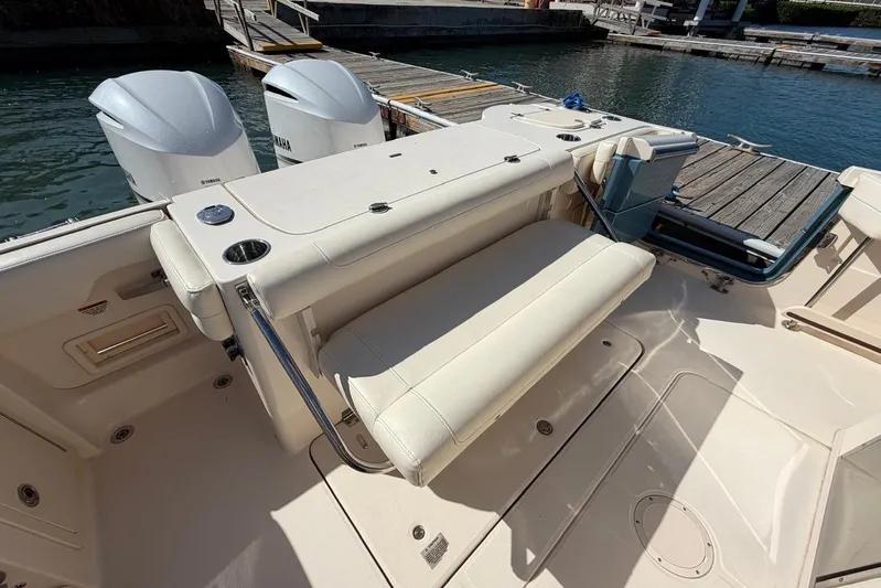  Yacht Photos Pics 2021 Grady-White Canyon 326 boat with Yamaha engines, docked at a marina.