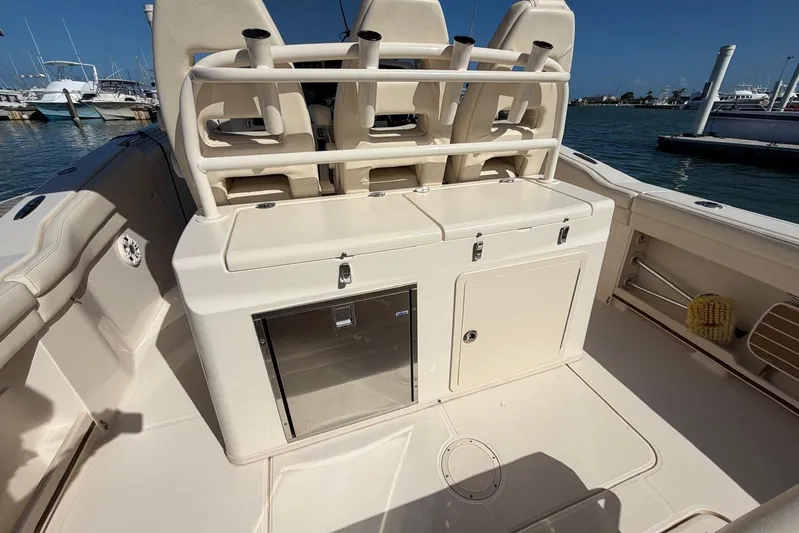  Yacht Photos Pics 2021 Grady-White Canyon 326 boat interior with rod holders and storage compartments.