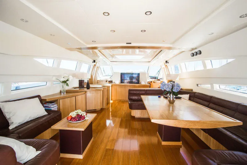  Yacht Photos Pics Luxurious interior of 2008 Dalla Pieta 80 yacht with elegant wood finishes and modern seating.