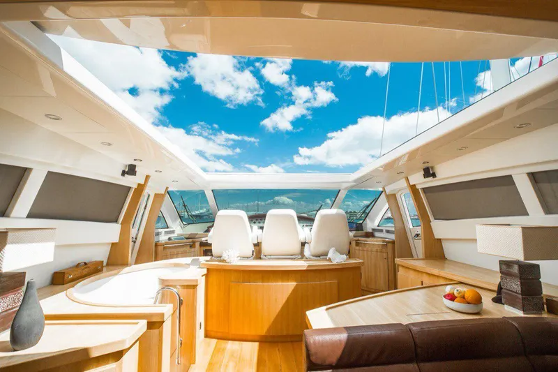  Yacht Photos Pics Luxurious interior of 2008 Dalla Pieta 80 yacht with panoramic views and elegant seating.