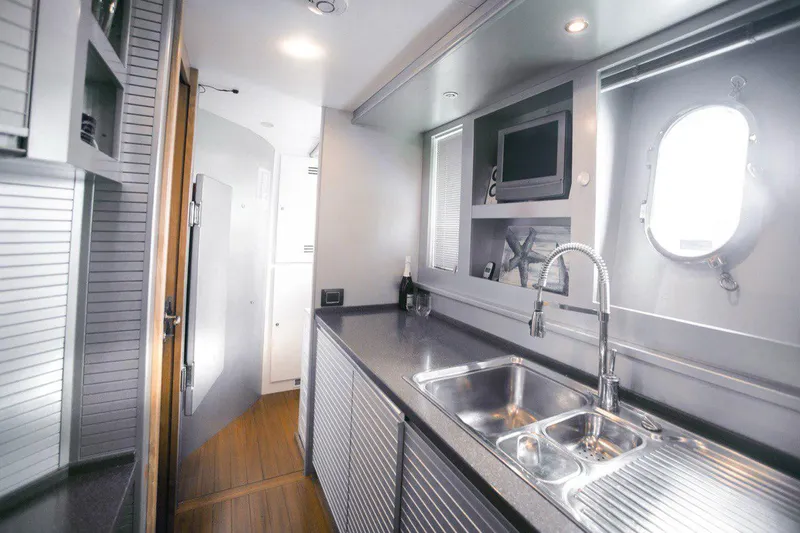  Yacht Photos Pics Modern kitchen interior on 2008 Dalla Pieta 80 yacht with sleek design and stainless steel sink.