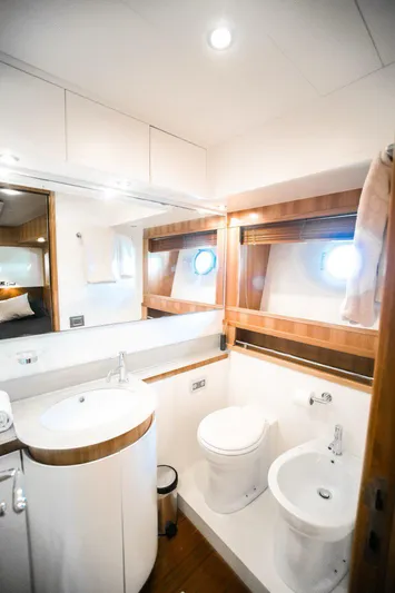  Yacht Photos Pics Luxurious bathroom on 2008 Dalla Pieta 80 yacht with modern fixtures and wood accents.